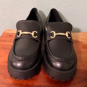 Black Loafers with Gold Detail